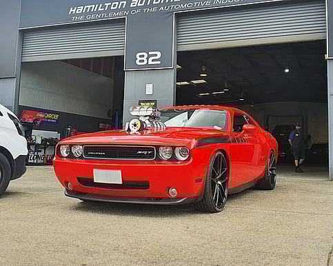 Hamilton custom car upgrades and modifications with red performance vehicle