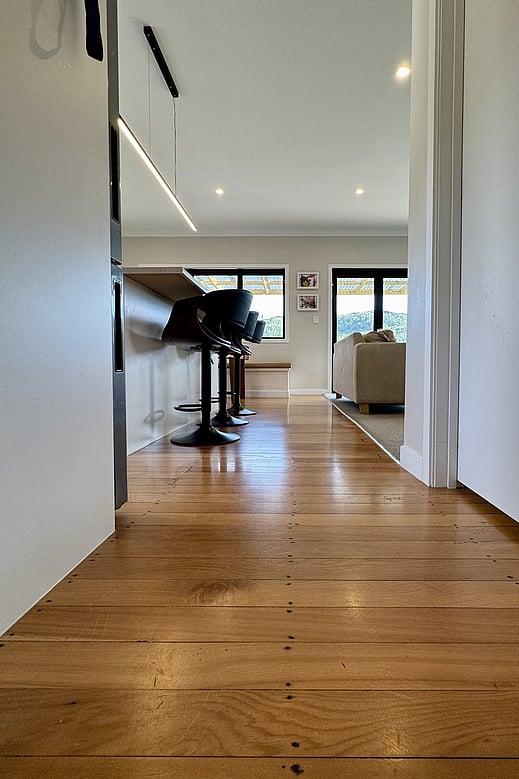 Close up of original and restored flooring in recently renovated Otorohanga home by Coull Builders. Waikato.
