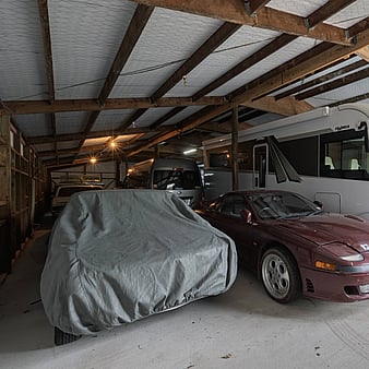 vehicles inside PB Group storage shed