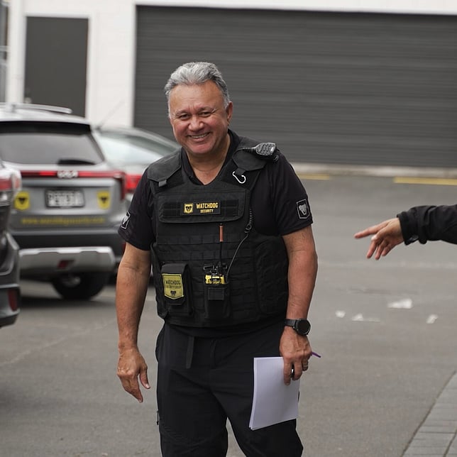 Watchdog Security Guard smiling while on duty