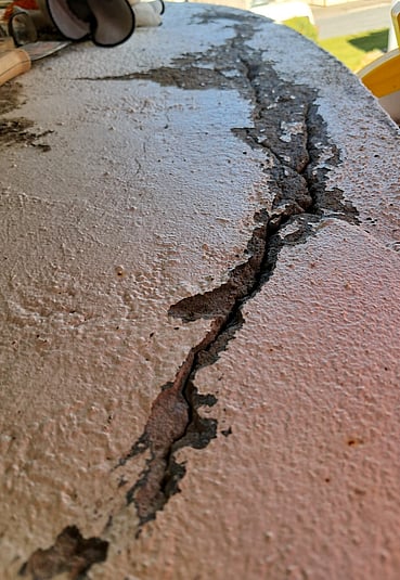 Cracks in painted concrete