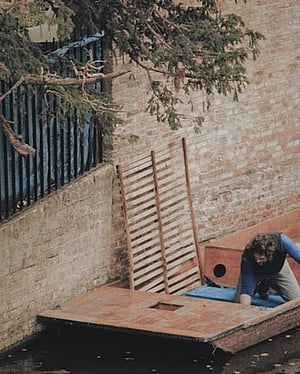 cleaning moss and mould from asbestos building