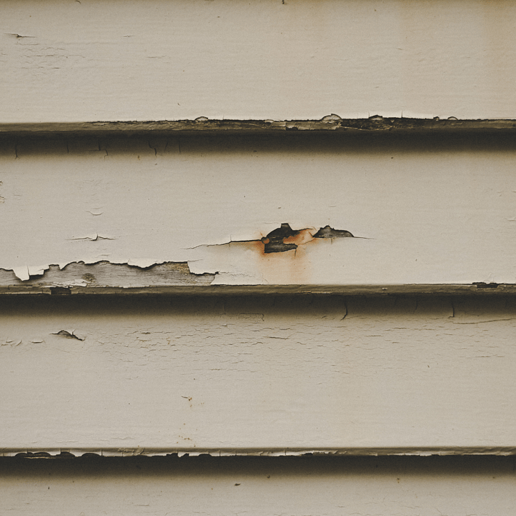 external cladding repairs needing to be performed by Bay Rebuild to a Rotorua home showing cracks and peeling in the exterior cladding