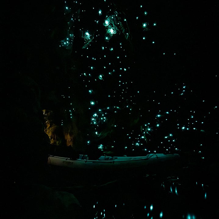 Kayak inside a glow worm cave