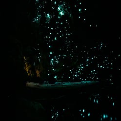 Kayak inside a glow worm cave