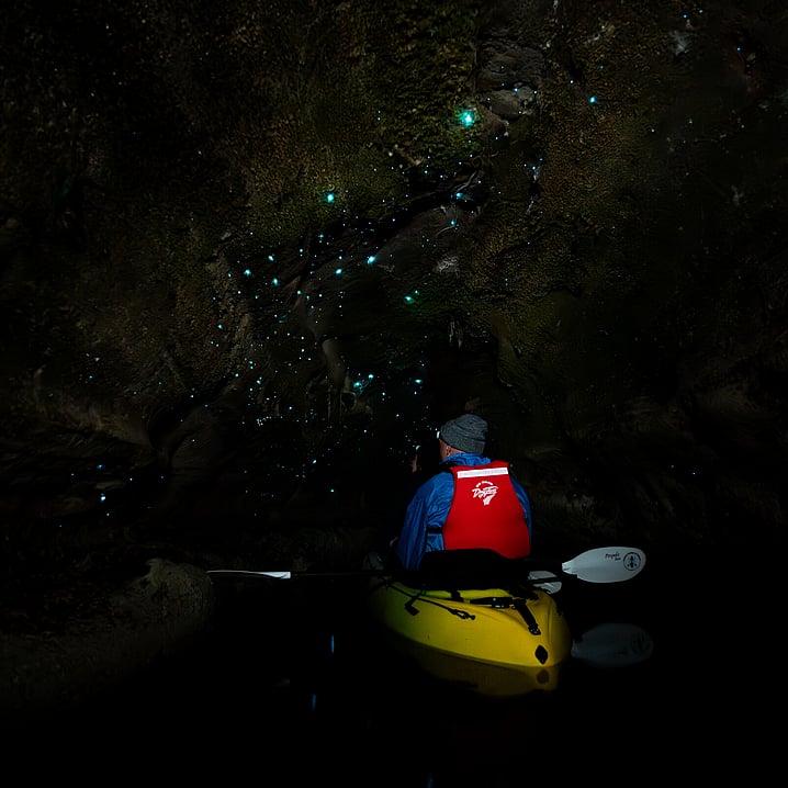 Kayak under a galaxy of Glow Worms