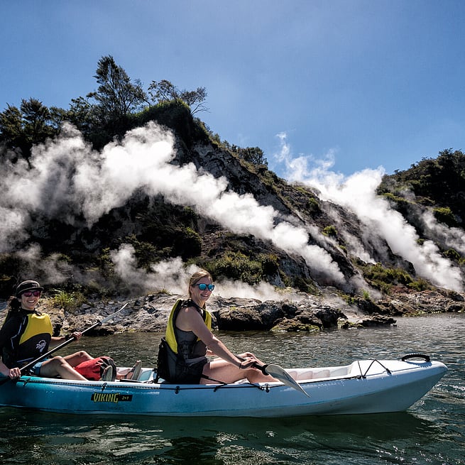 Steaming Cliffs Close Up Kayakers on  Geothermal Fumarol Geyser Tour 