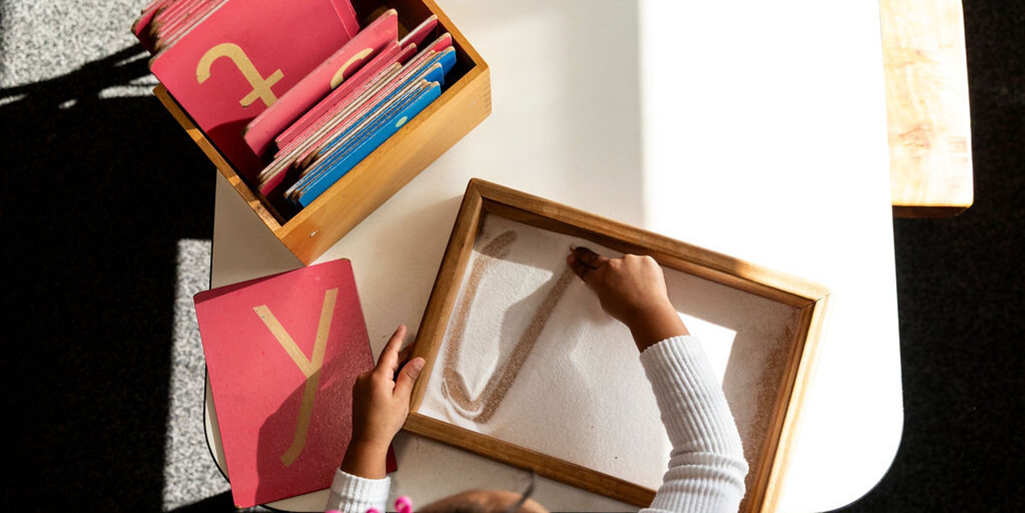 Sand letters &ndash; early phonics at Koru Montessori