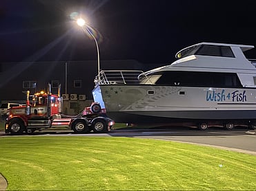 Heavy Haulage truck in Tauranga towing boat