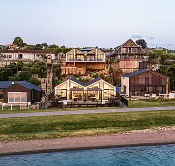 Roam Taupo Lakefront units exterior in the evening with sunset