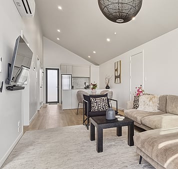 Living area in accommodation in Taupo with tv and streaming services 