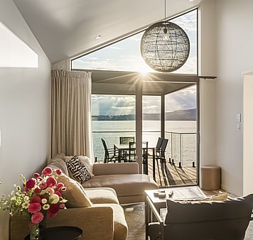 Large deck and dining area overlooking lake taupo