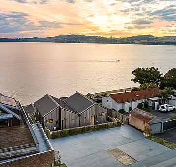 Large deck and dining in the upper terrace units in taupo, new zealand