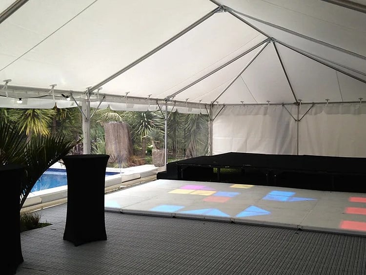 Raised platform floor and dance floor inside marquee &ndash; stage and flooring rental Auckland
