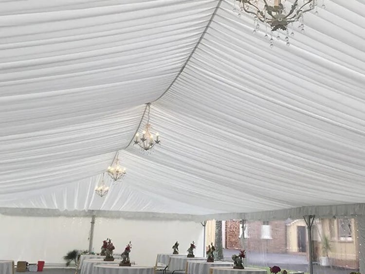 Elegant ceiling draping inside white marquee &ndash; ceiling draping hire Auckland