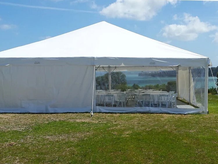 Complete marquee setup with flooring, lighting, tables, and decor &ndash; full-service marquee hire Auckland
