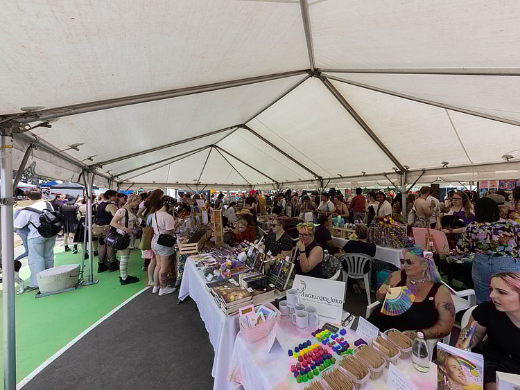 Corporate event marquee with presentation area, full seating, and branded signage &ndash; complete business marquee hire Auckland