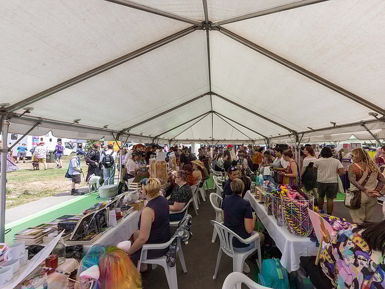 Corporate event marquee with presentation area, full seating, and branded signage &ndash; complete business marquee hire Auckland