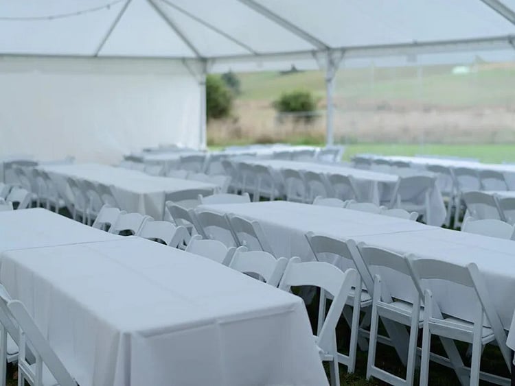 White trestle tables arranged for catering &ndash; event table hire Auckland
