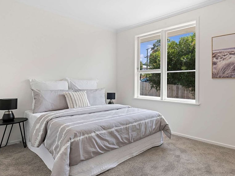Image of a residential home renovation. Newly renovated bedroom by Auckland builders, Eden Construction. New Zealand.