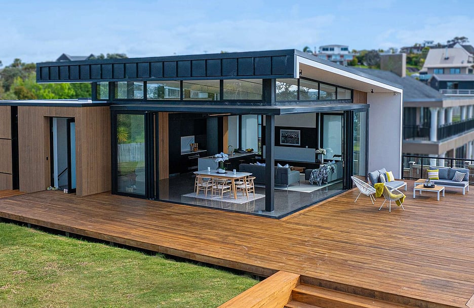 Image of a residential home renovation. Newly remodelled exterior, decking and landscaping by Auckland builders, Eden Construction. New Zealand.