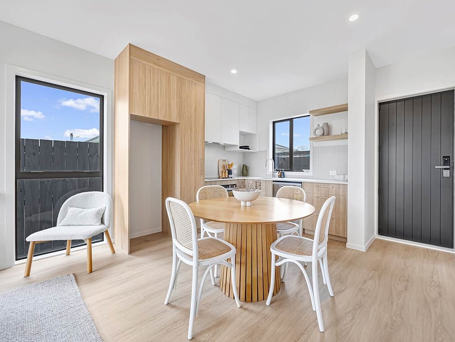 Image of modern living space inside one of six architecturally designed family townhouses on Tapu Road, Huapai, Auckland. Built by Auckland builders, Eden Construction. New Zealand.