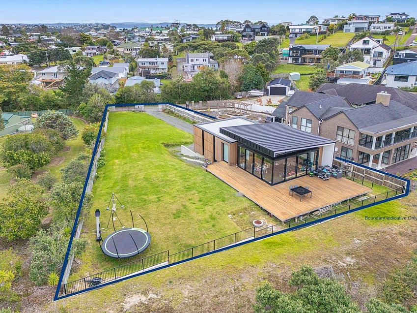 Image of a residential home renovation. Photo of exterior and landscape before renovation.