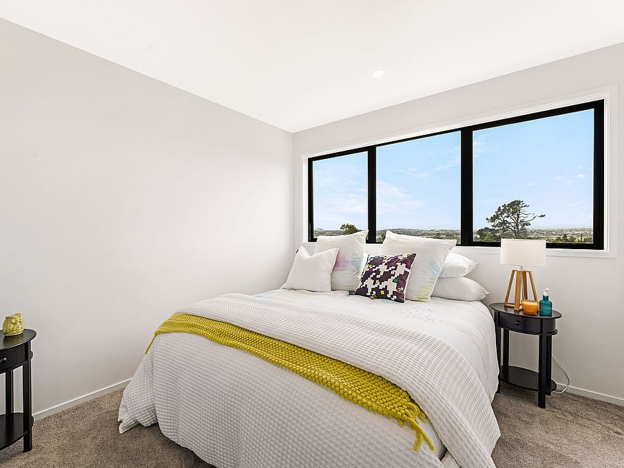 Image of the a bedroom inside the residential new build townhouses on Roland Hill, Glen Eden, Auckland. Built by Auckland builders, Eden Construction. New Zealand.