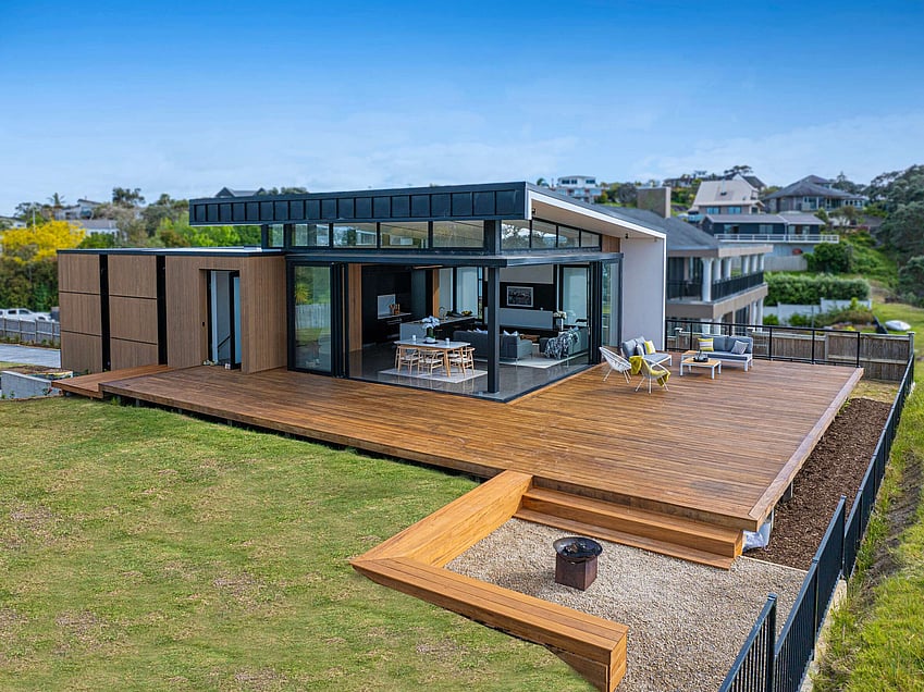 Image of a residential home renovation. Newly remodelled exterior, decking and landscaping by Auckland builders, Eden Construction. New Zealand.