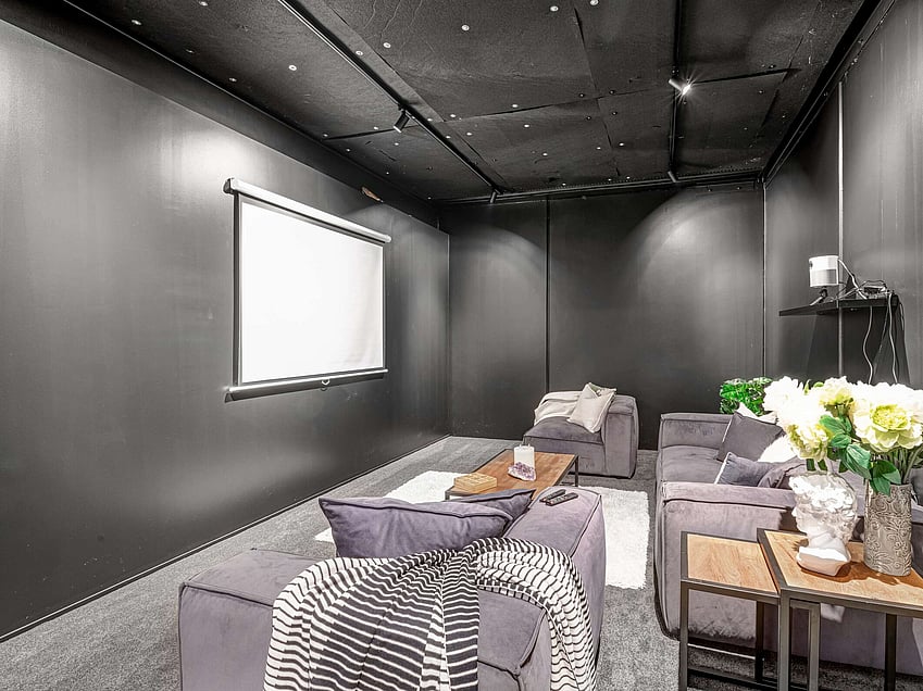 Image of a residential home renovation. Newly remodelled cinema room by Auckland builders, Eden Construction. New Zealand.