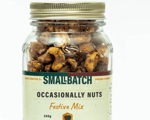 Occasionally Nuts Festive Mix in a stylish mason jar &mdash; premium blend of roasted nuts, aromatic spices and festive flavours &mdash; a tasteful gourmet gift complementary to floral arrangements at Flowers by Joanne