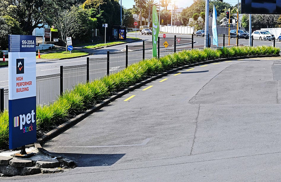 Black aluminimum pool fencing with charcoal composite boundary fence