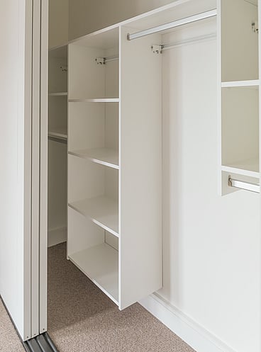 Wall hung wardrobe system in white
