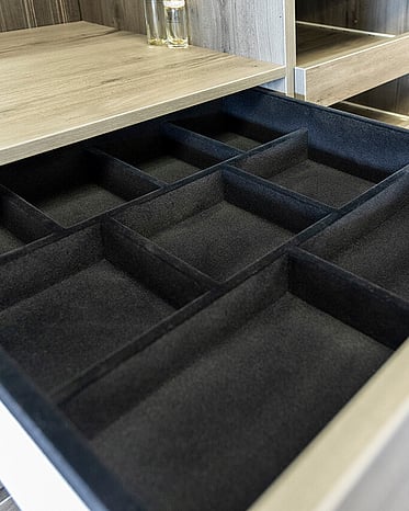 An open flocked sectional drawer