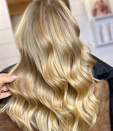 Gorgeously styled wavy and shiny hair by Amy at Auburn and Ash Hair.