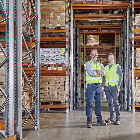 Craig Brown Photographer's image of two men standing in a warehouse