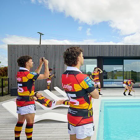 Craig Brown Photographer's image of waikato rugby players around a pool