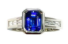 Emerald cut Ceylonese Sapphire & baguette diamonds set in Platinum