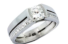 Cushion cut centre stone, split shank set in Platinum