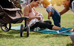 Childcare worker with baby