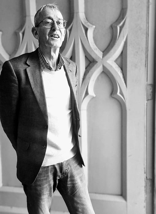 Ian Cassels at the entrance of 110 Featherston Street, a building in his commercial portfolio.