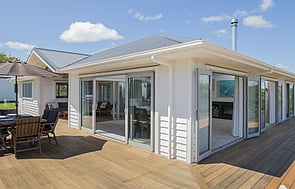 Decking - Give your outside entertaining area a tidy up with hardwood or pine decking and perhaps a pergola.