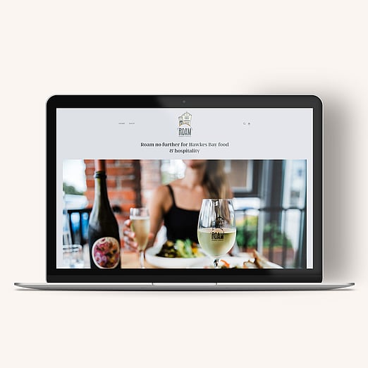Image of ROAM website. Laptop mockup. Cafe, grazing box and private chef in Napier. Designed by Kelly at Creative Box. New Zealand.