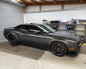 Right view of Dodge Challenger with pinstriping