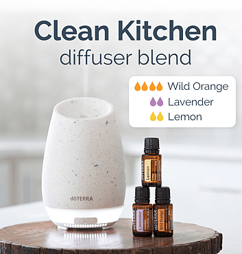 Diffuser Blend Recipe with a Diffuser and a stack of Essential oils on a table