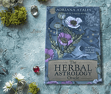 The Herbal Astrology Oracle on a background of moss and gem