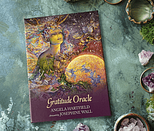 Gratitude Oracle by Angela Hartfield on a moss and gem background featured on oracle cards and oils website