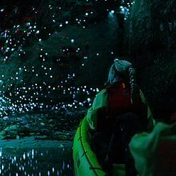 Customer surrounded by glow worms in natures most stunning light show