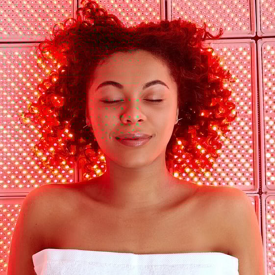 Image of a woman relaxing during a LightStim treatment