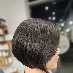 A beautiful bright red/pink long hair colour by Hair by Shiyee.